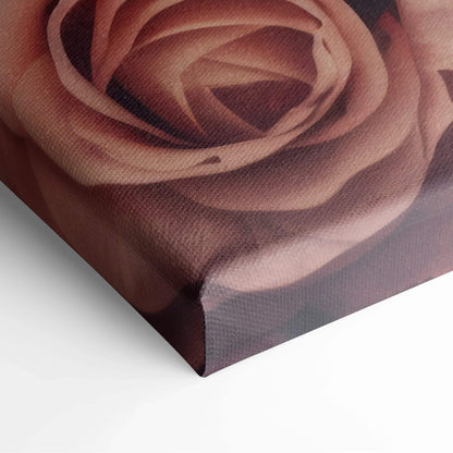 Close-up of canvas wall art featuring a richly detailed red and pink rose print with textured fabric surface and wrapped.