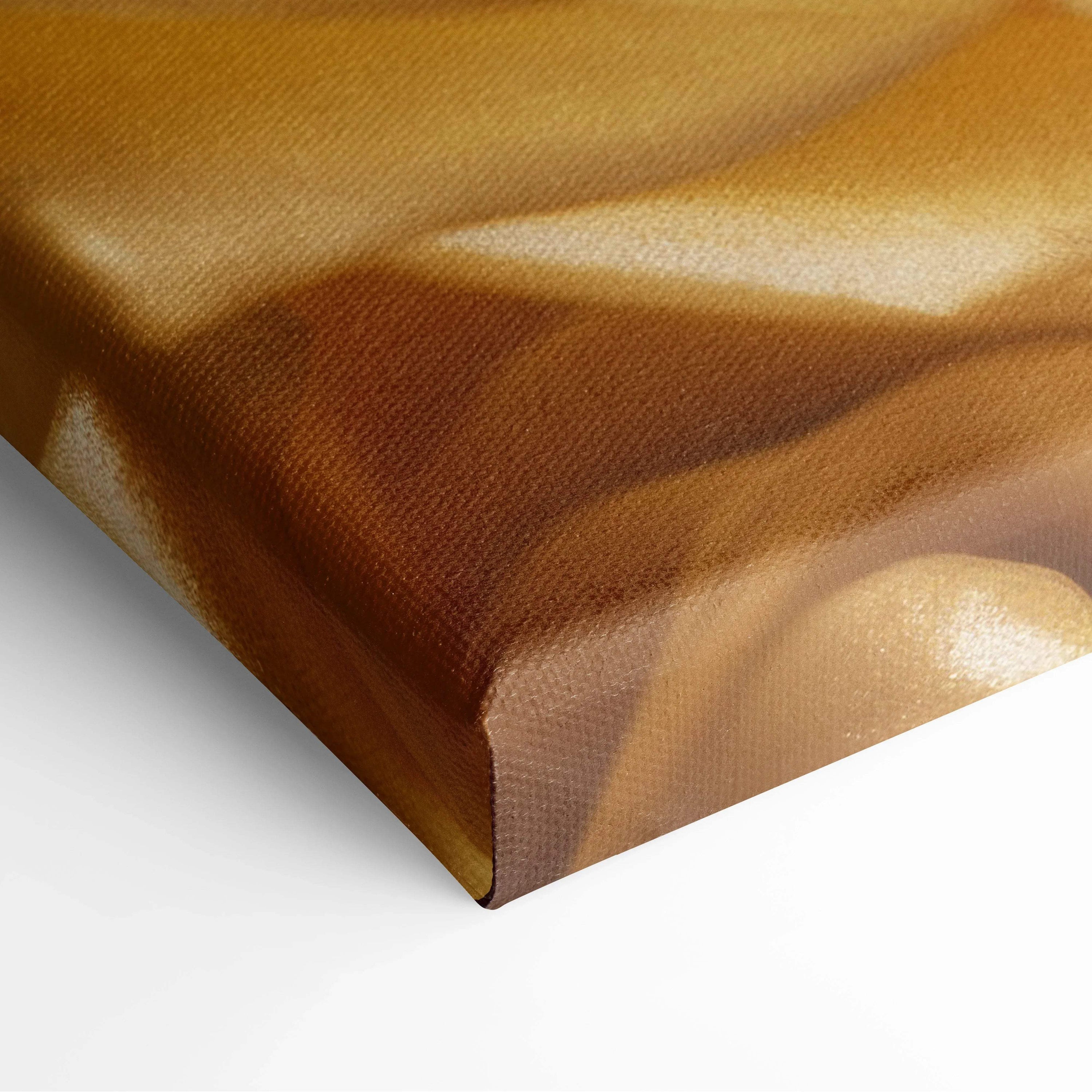 Close-up of textured canvas wall art featuring vibrant gold and yellow roses with rich warm tones for elegant decor.