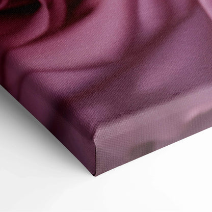 Close-up of vibrant pink roses printed on textured canvas corner, showcasing vivid floral wall art decor.