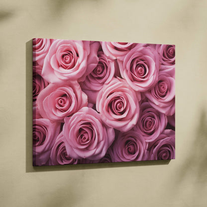 Canvas wall art featuring vibrant pink roses in close-up, ideal floral decor piece.