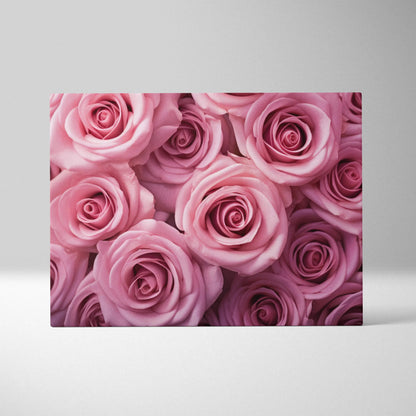 Vibrant pink roses tightly arranged on rectangular canvas wall art with soft shadows and rich texture.