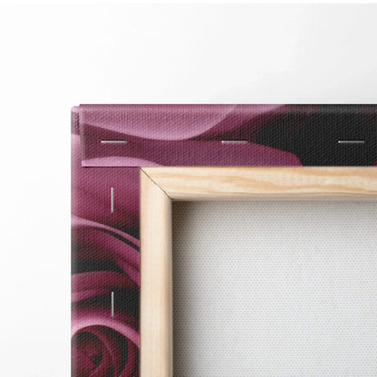 Close-up of pink roses canvas wall art corner showing wooden frame and floral decor design.