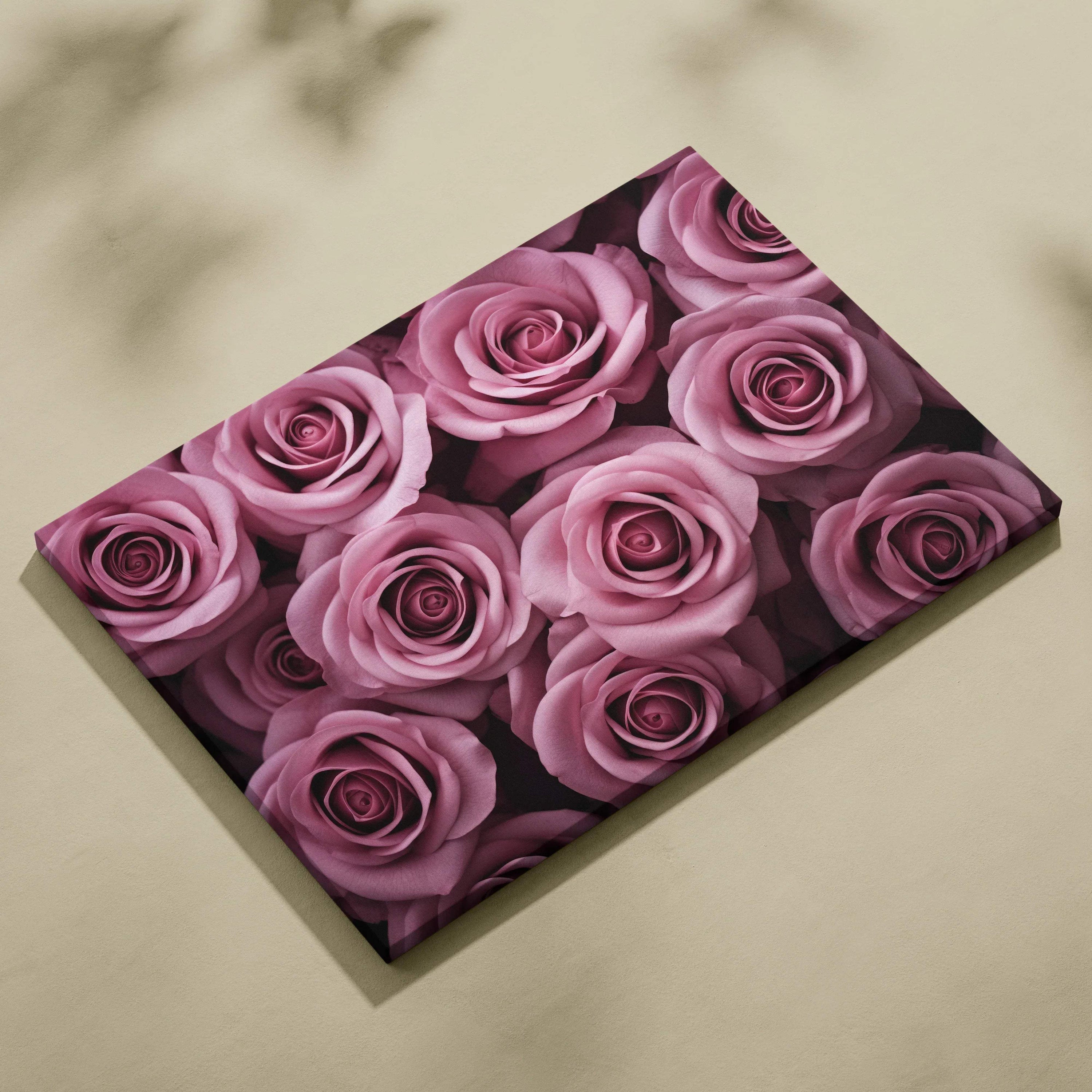 Canvas wall art featuring a close-up of vibrant pink roses, elegant floral decor.