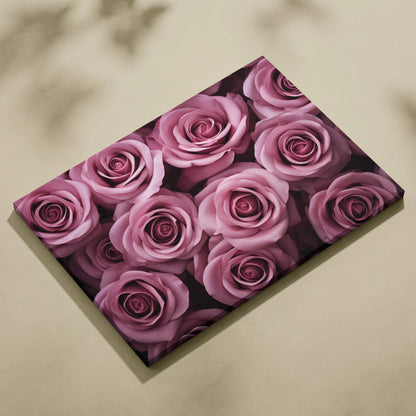 Canvas wall art featuring a close-up of vibrant pink roses, elegant floral decor.
