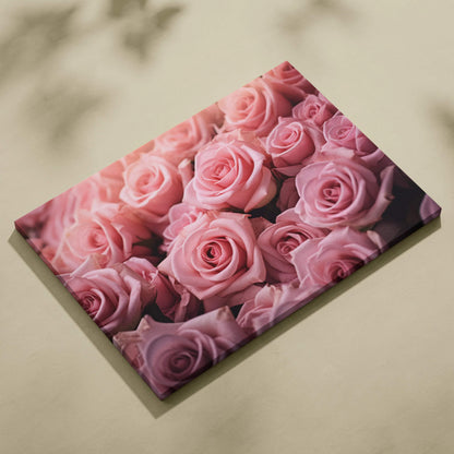Canvas wall art featuring vibrant, close-up pink roses in full bloom for floral decor.