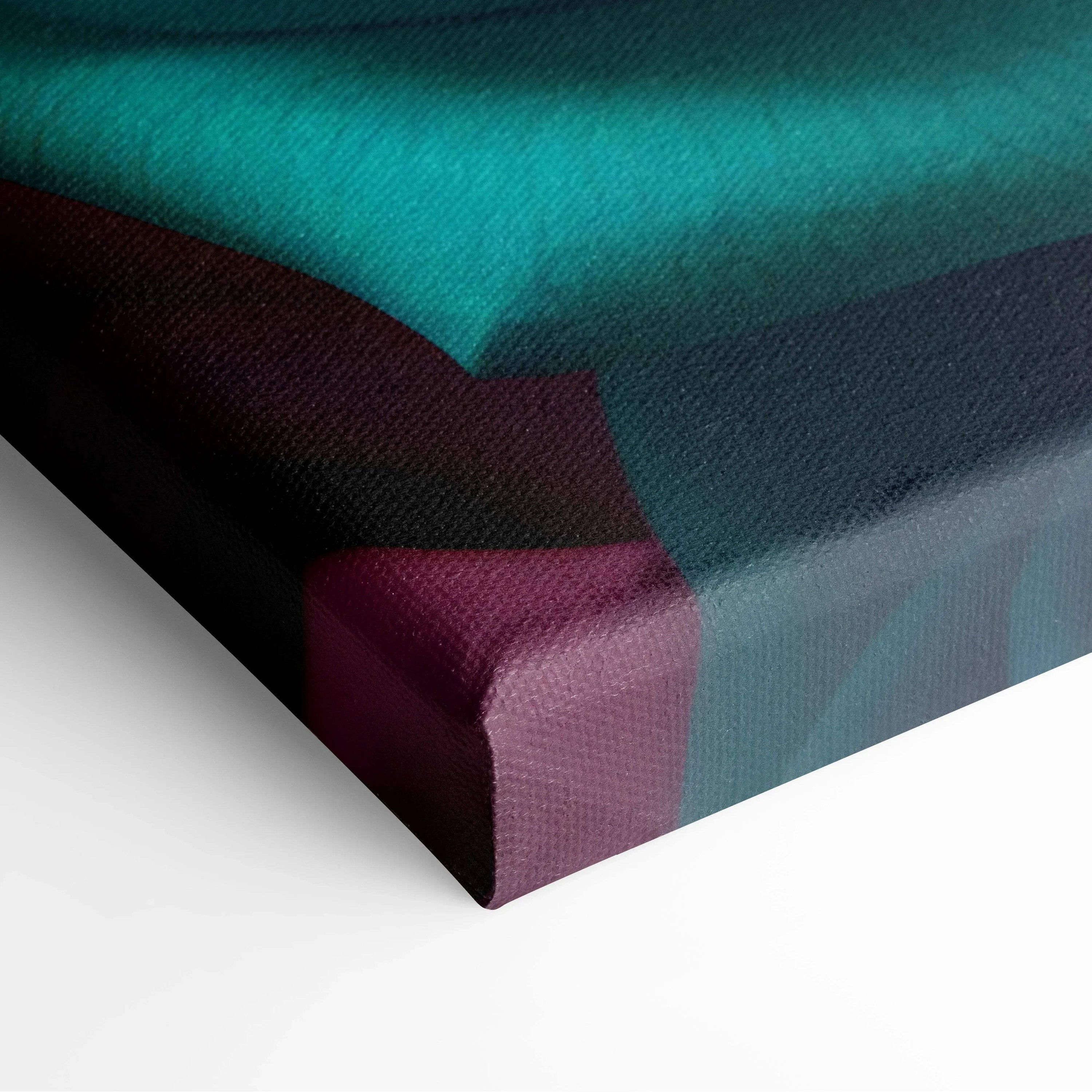 Close-up of thick canvas with teal, purple, and black abstract colors on floral wall art print.