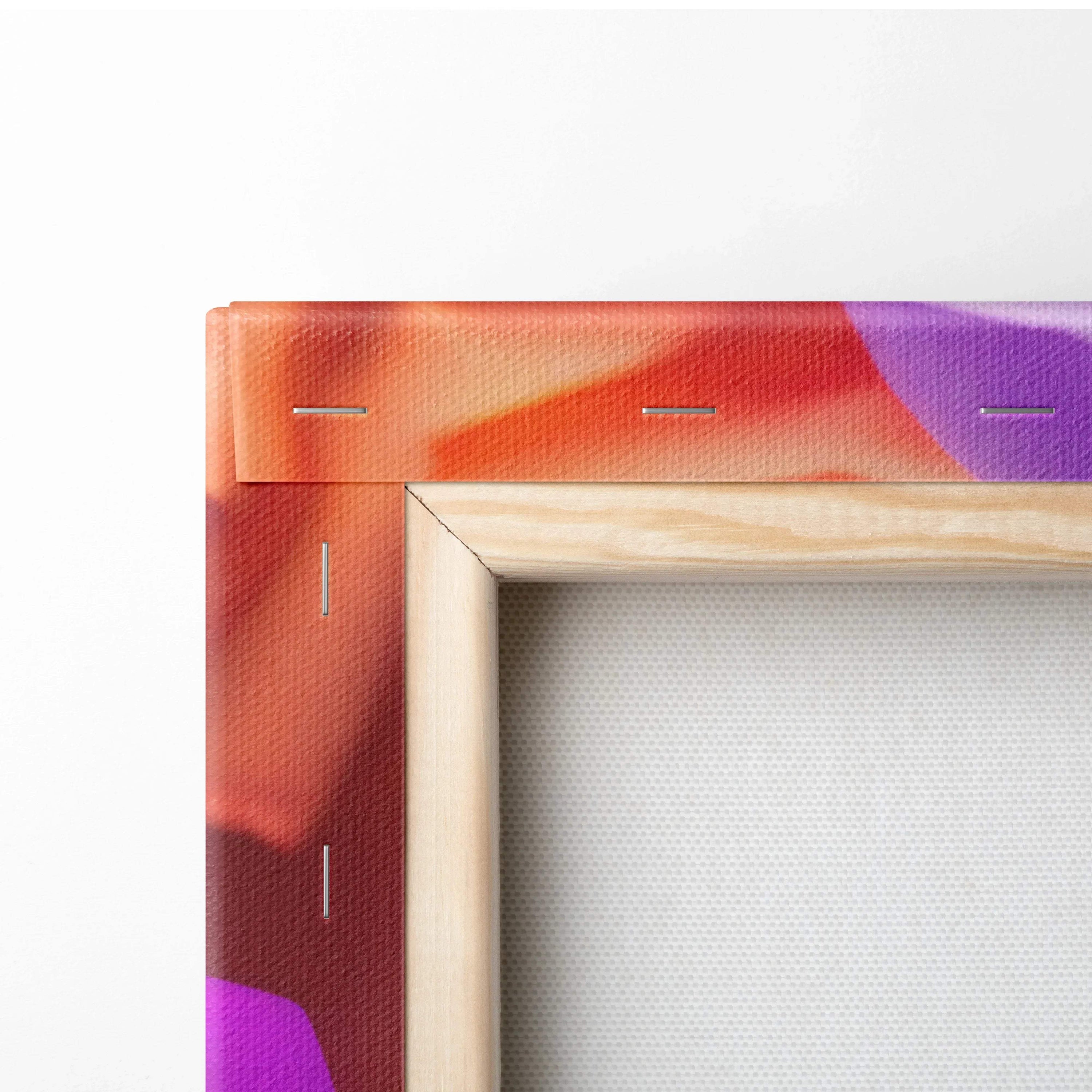 Close-up of stretched canvas wall art with multicolor vibrant floral print and natural wooden frame.