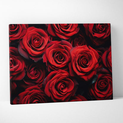 Vibrant red roses close-up on canvas wall art with rich detail and elegant decor appeal.