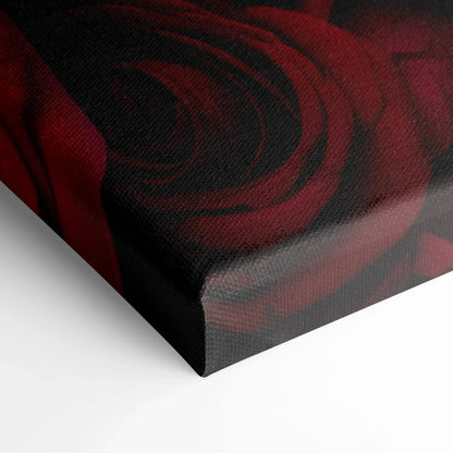 Close-up of vibrant red rose petals on textured canvas wall art with rich color saturation and detailed floral design.