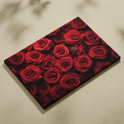 Canvas wall art featuring a close-up of vibrant red roses with rich texture and deep shadows.