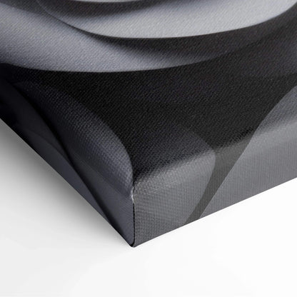 Close-up of canvas wall art corner featuring overlapping grey rose petals with smooth shading and textured fabric surface.