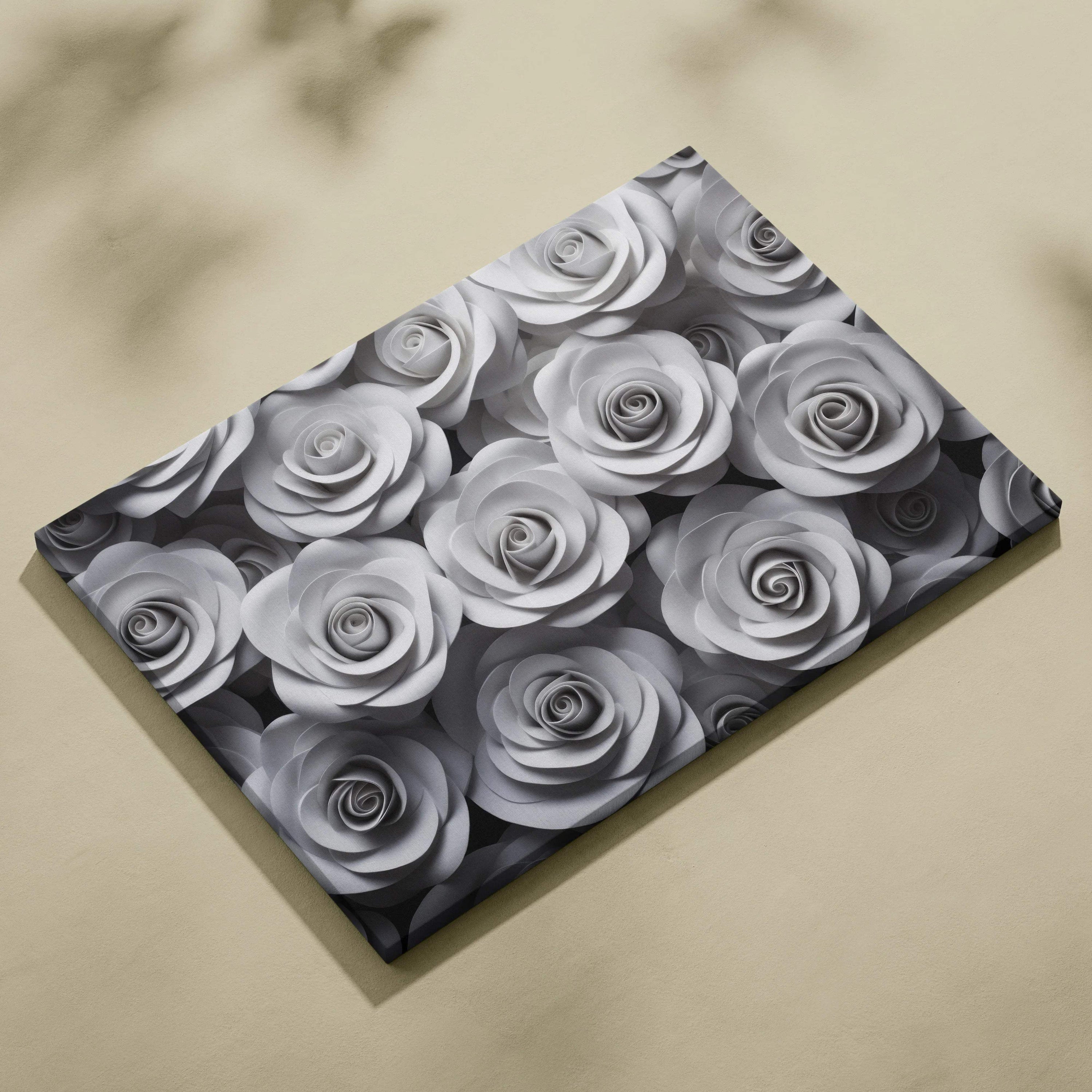 Canvas wall art featuring a pattern of detailed grey roses with soft shadows and textured petals.