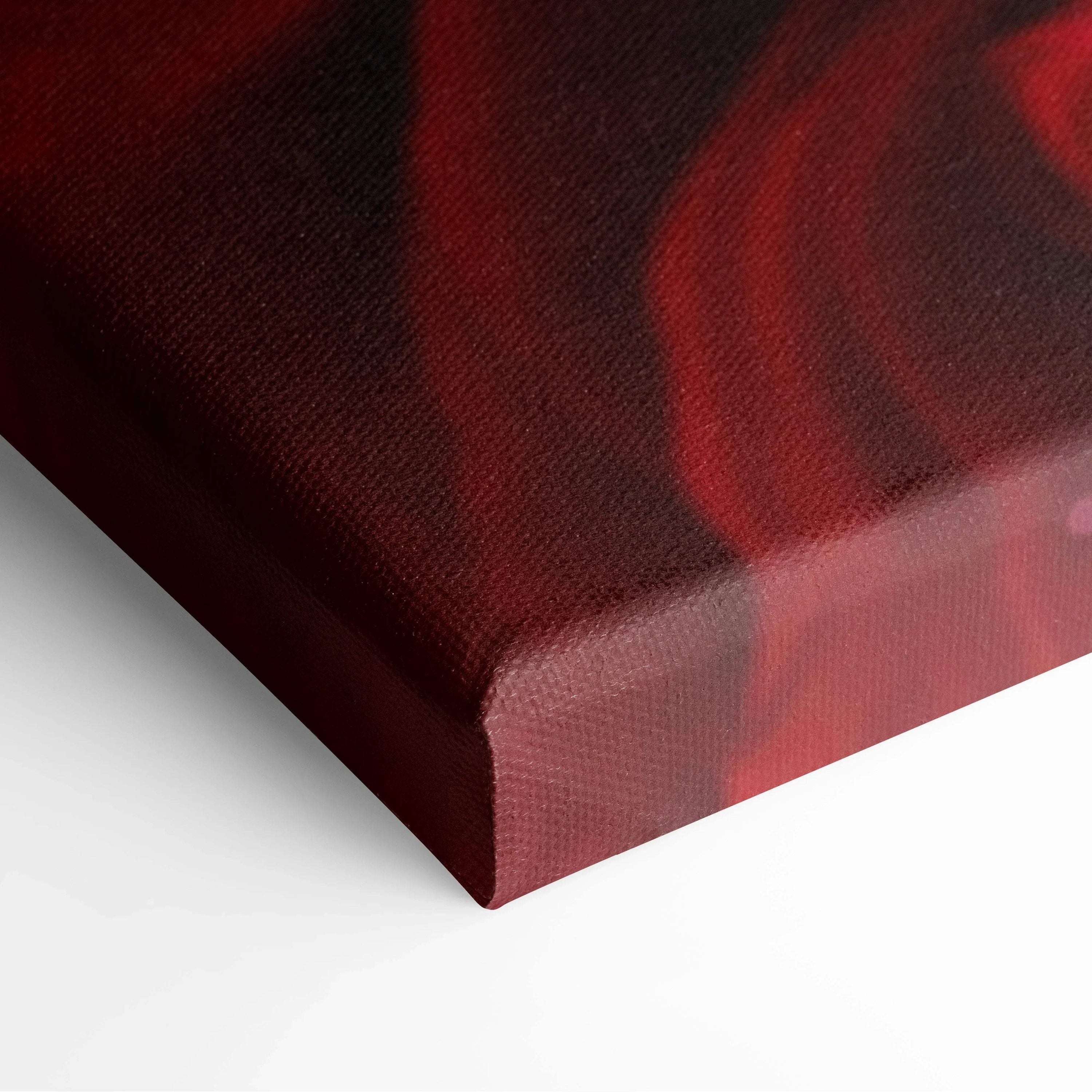 Close-up of textured canvas wall art featuring deep red wet roses with rich color and glossy detail.