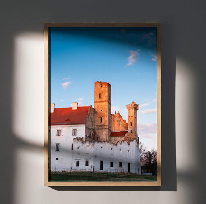 Elegant building architecture wall art poster featuring historic castle with white walls and red rooftops under a blue sky.