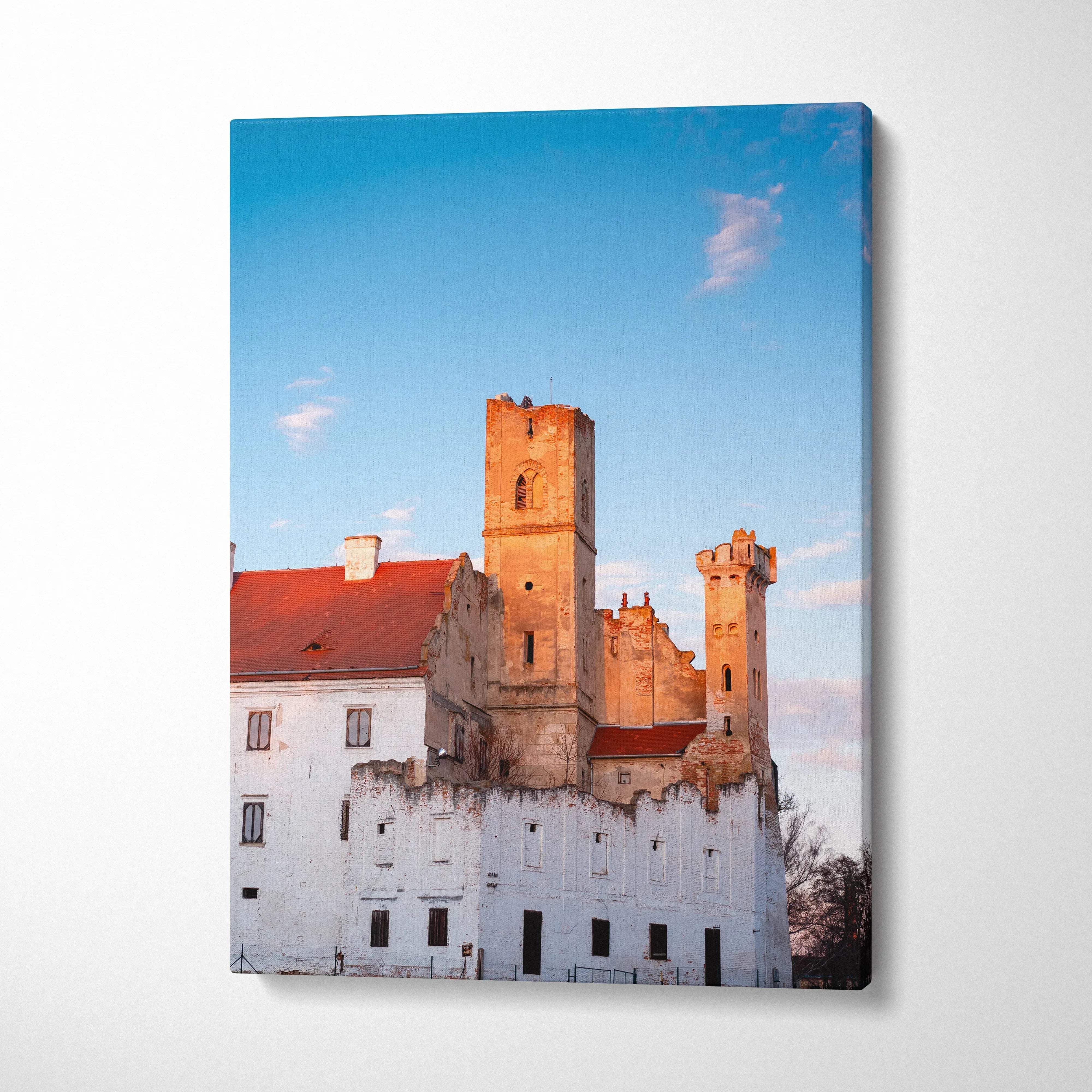 Canvas wall art featuring historic castle towers against a clear blue sky at sunset.