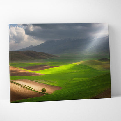 Cinematic canvas art of sunlit valleys, rolling fields under stormy mountains