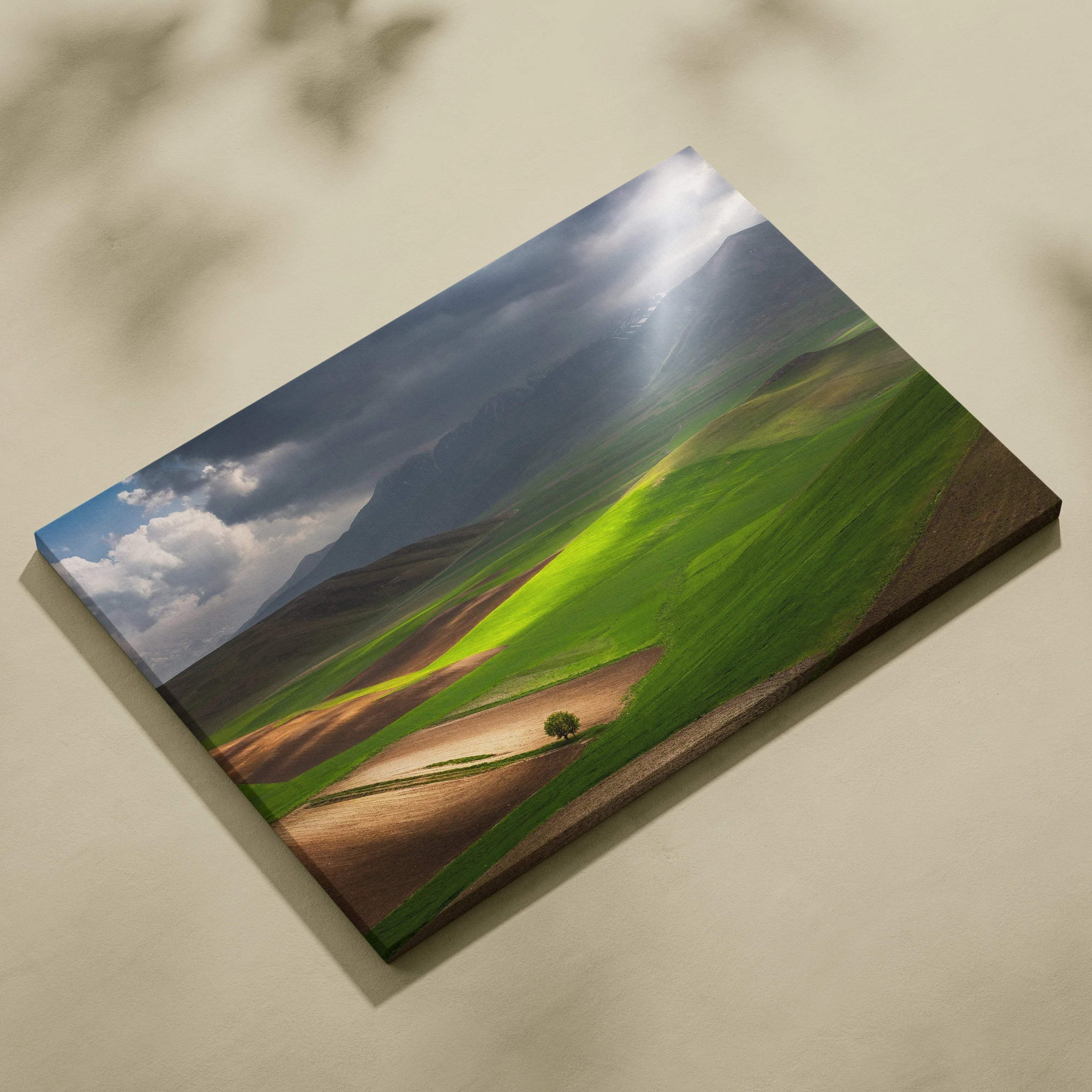 Cinematic sunlit valleys and rolling fields canvas art under stormy mountains