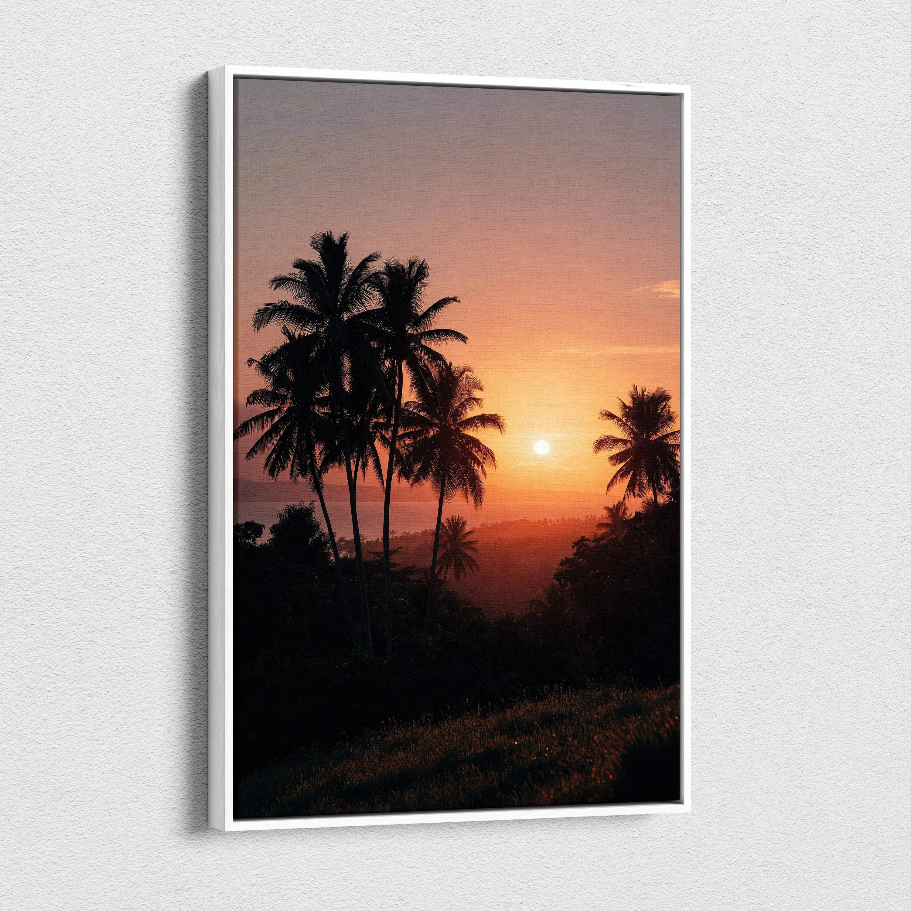 Vertical canvas wall art featuring a beach sunset with silhouetted palm trees against an orange sky.