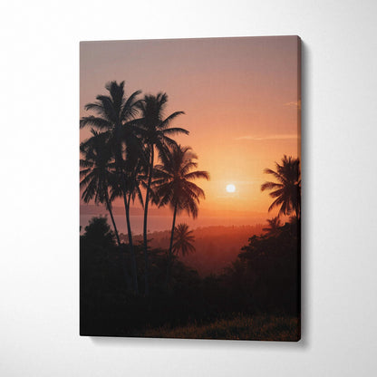 Canvas wall art featuring a vibrant beach sunset with silhouetted palm trees against an orange sky.