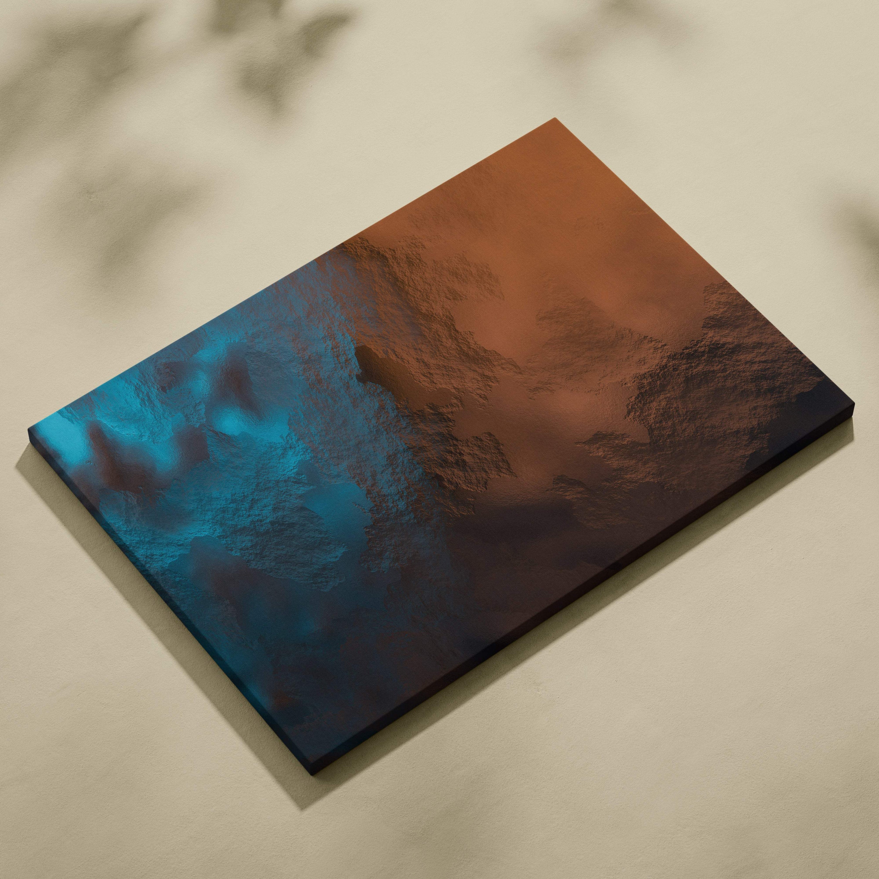 A rectangular canvas print with a blue to rust-orange gradient depicting an abstract mountainous landscape for modern decor