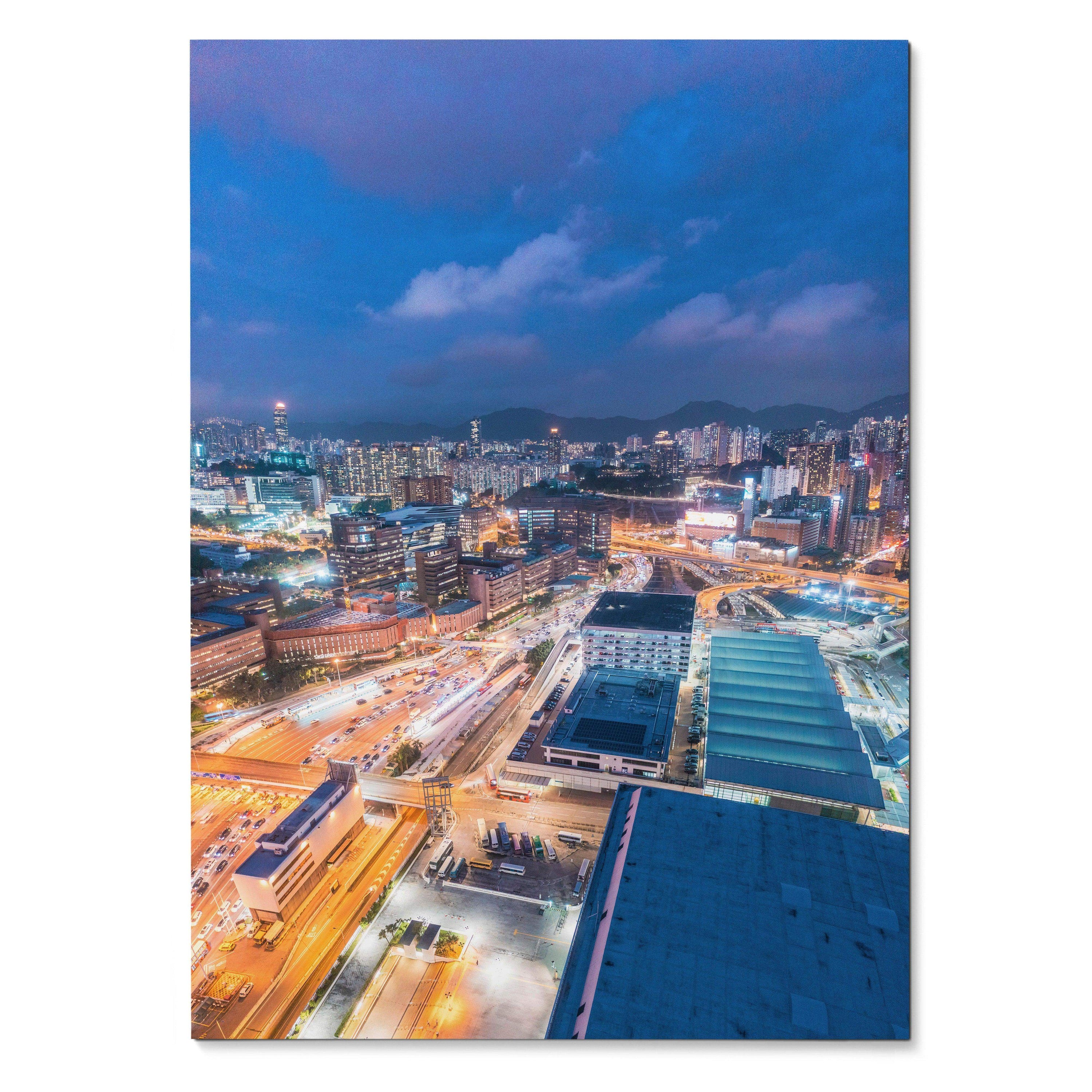 Vertical urban night skyline wall art poster with illuminated city buildings and streets.
