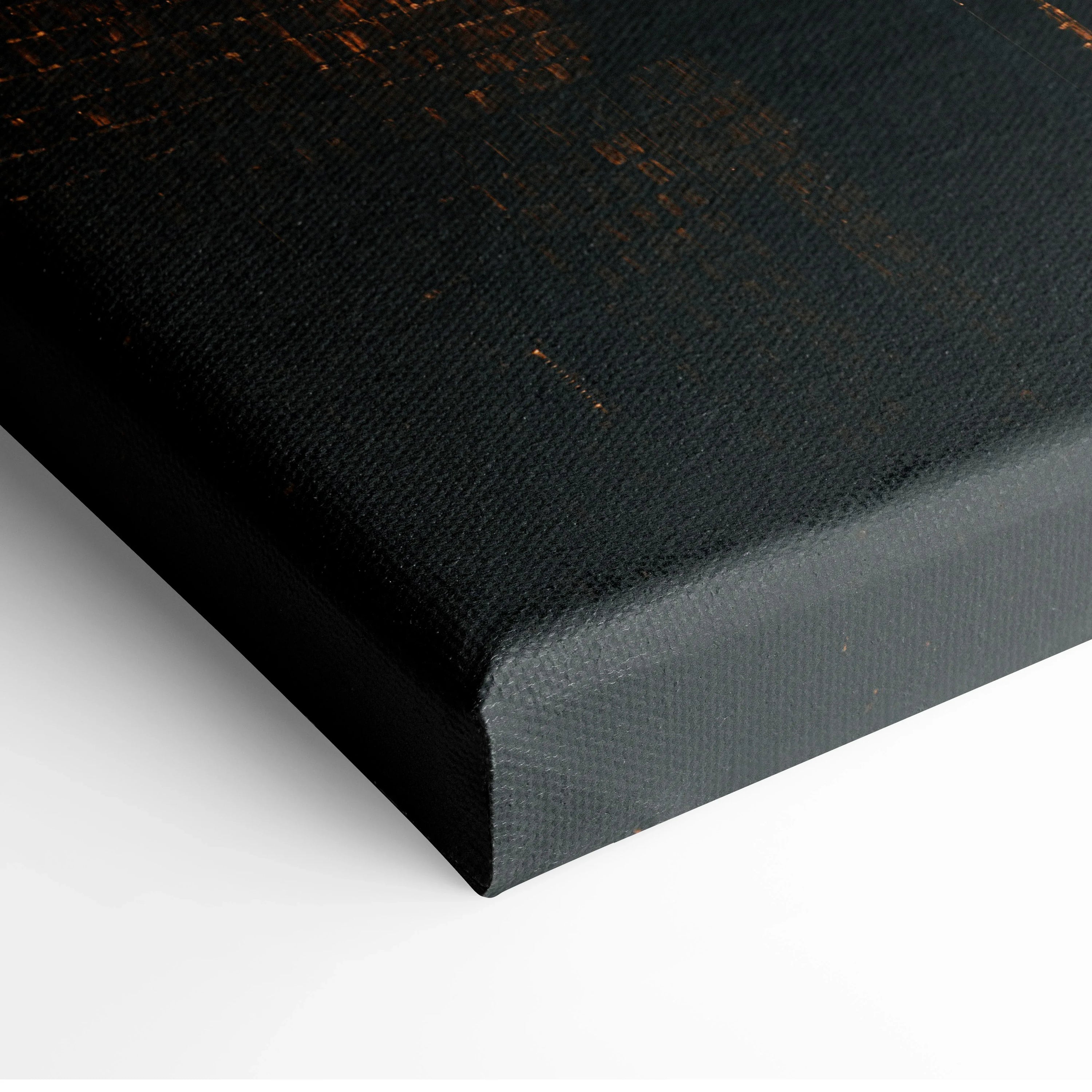 Close-up of black textured canvas wall art corner with subtle distressed details.