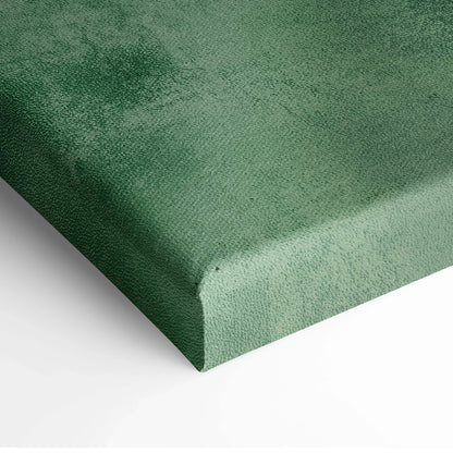 Close-up of green textured canvas corner of vertical wall art print with subtle painted details.