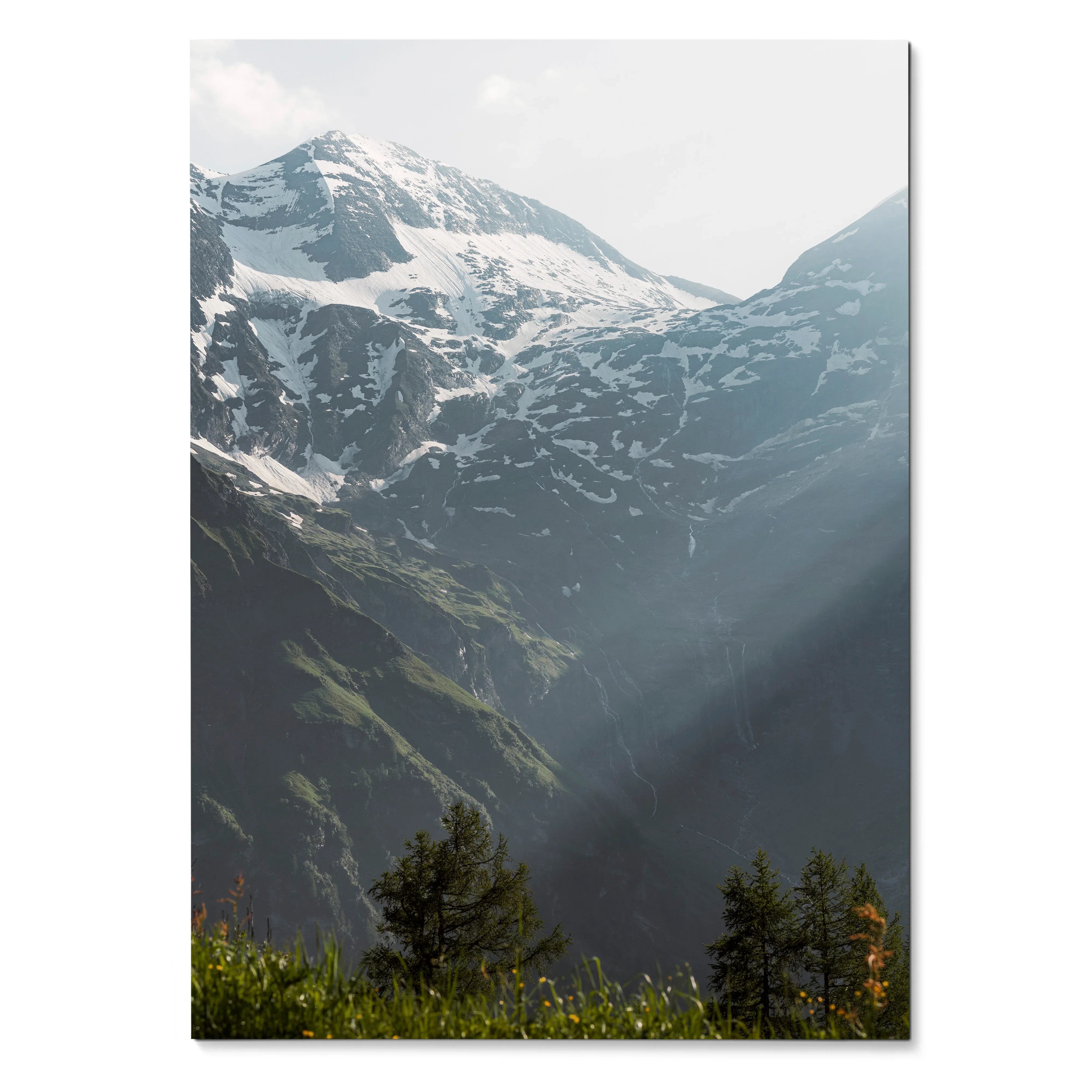 Vertical wall art poster of snow-capped mountains with sunlight rays over green forest.