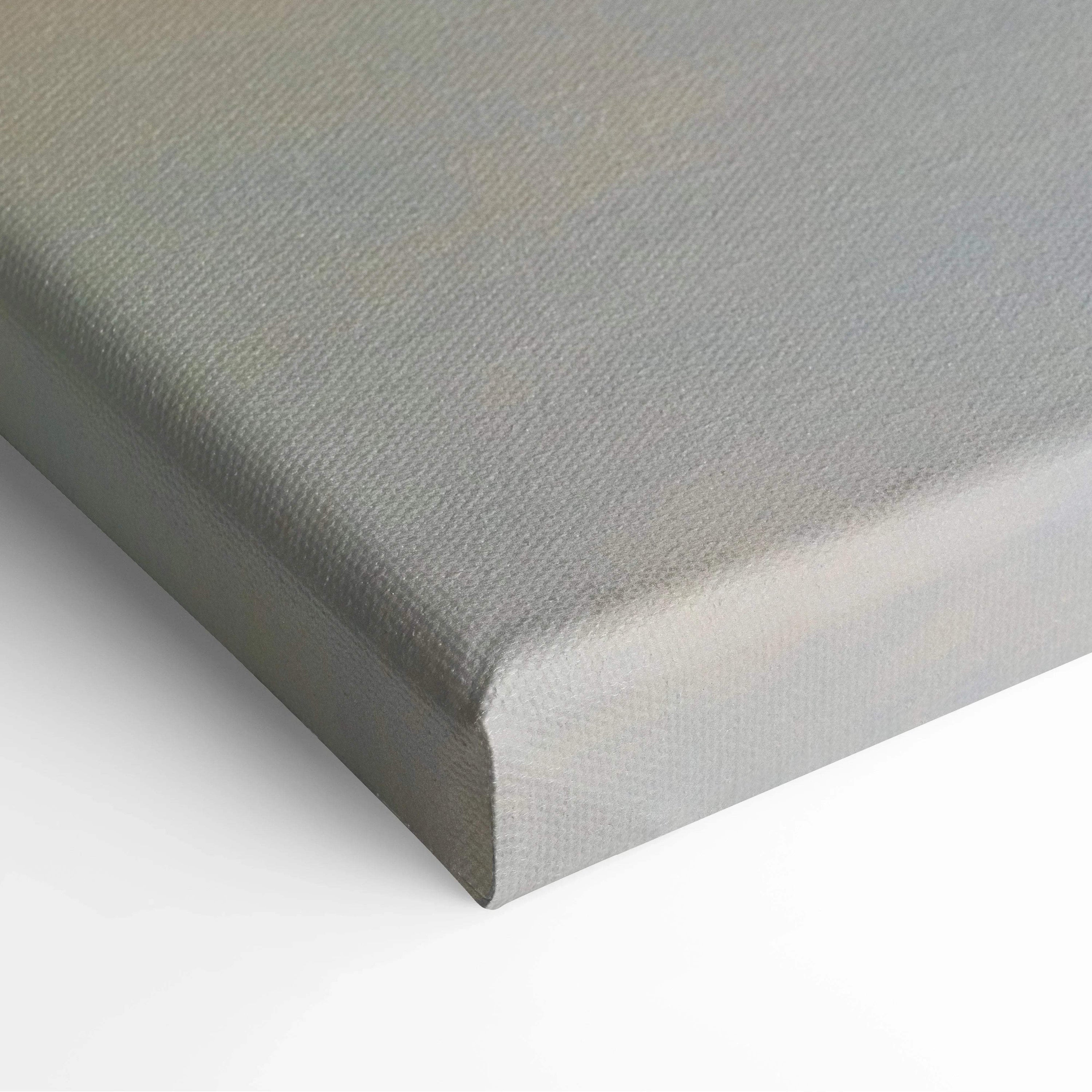 Gray textured canvas corner close-up showing wrapped edge for wall art.