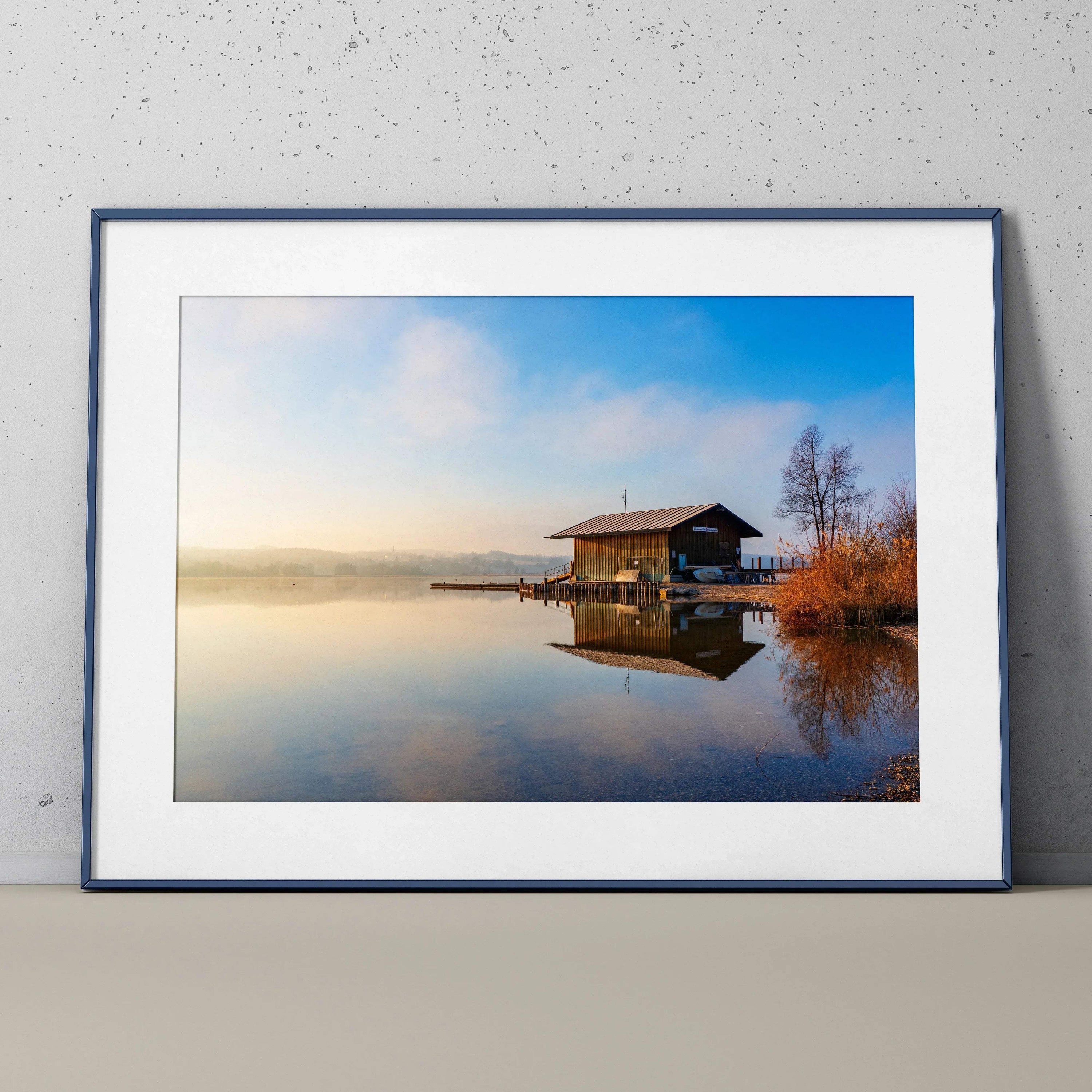 Serene building landscape wall art with calm water reflection and soft morning light poster.