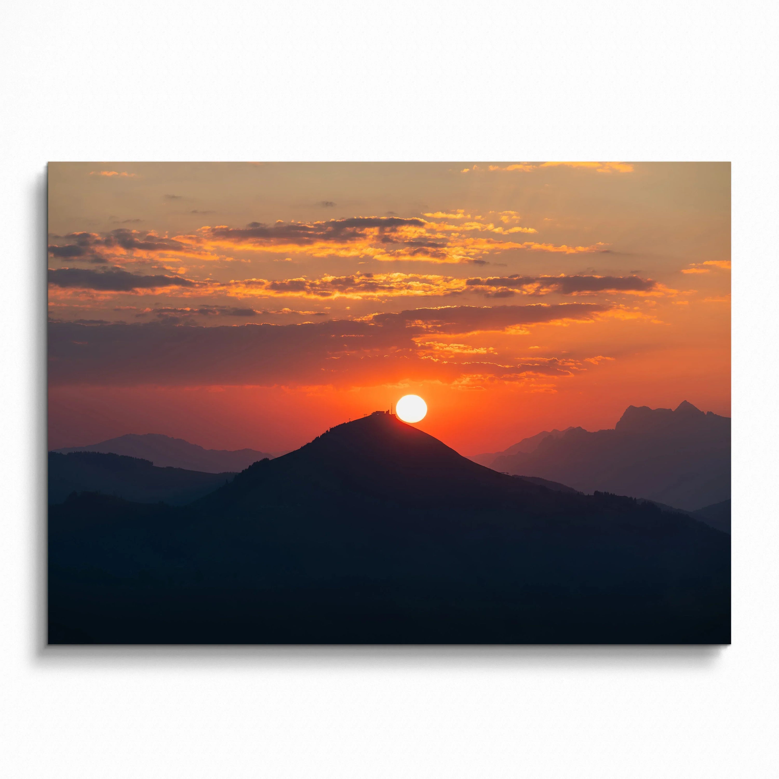 Vibrant sunset over mountain silhouette with orange and red sky, wall art poster.