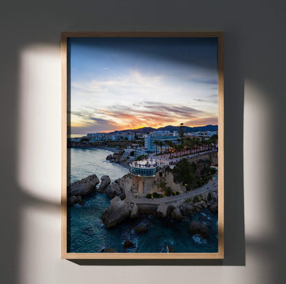 Vertical city sunset art print poster featuring vibrant sky and coastal buildings framed as wall art.