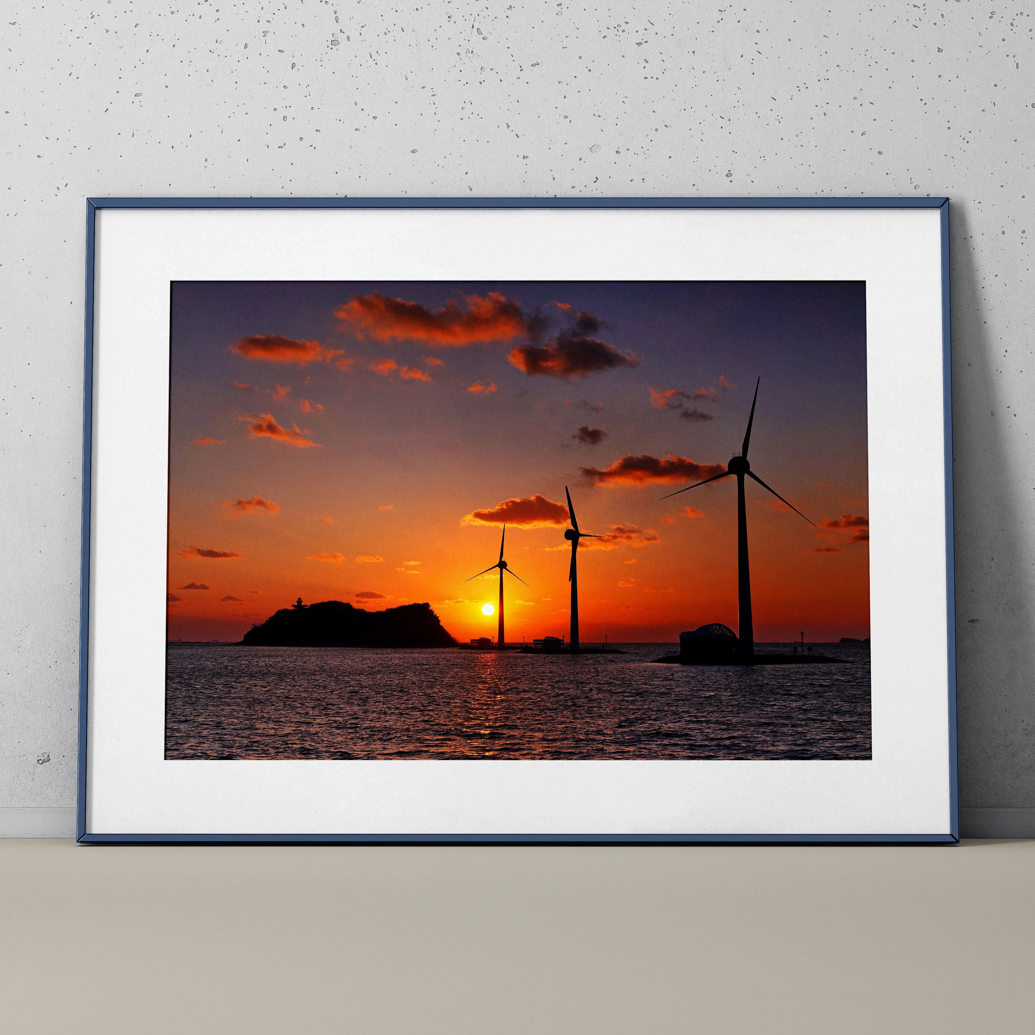Serene ocean sunset poster with wind turbines silhouette and vibrant orange sky wall art.