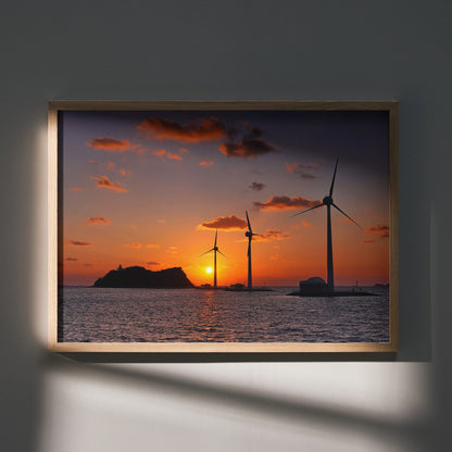 Sunset ocean poster with wind turbines and island silhouette in warm orange and purple tones wall art.