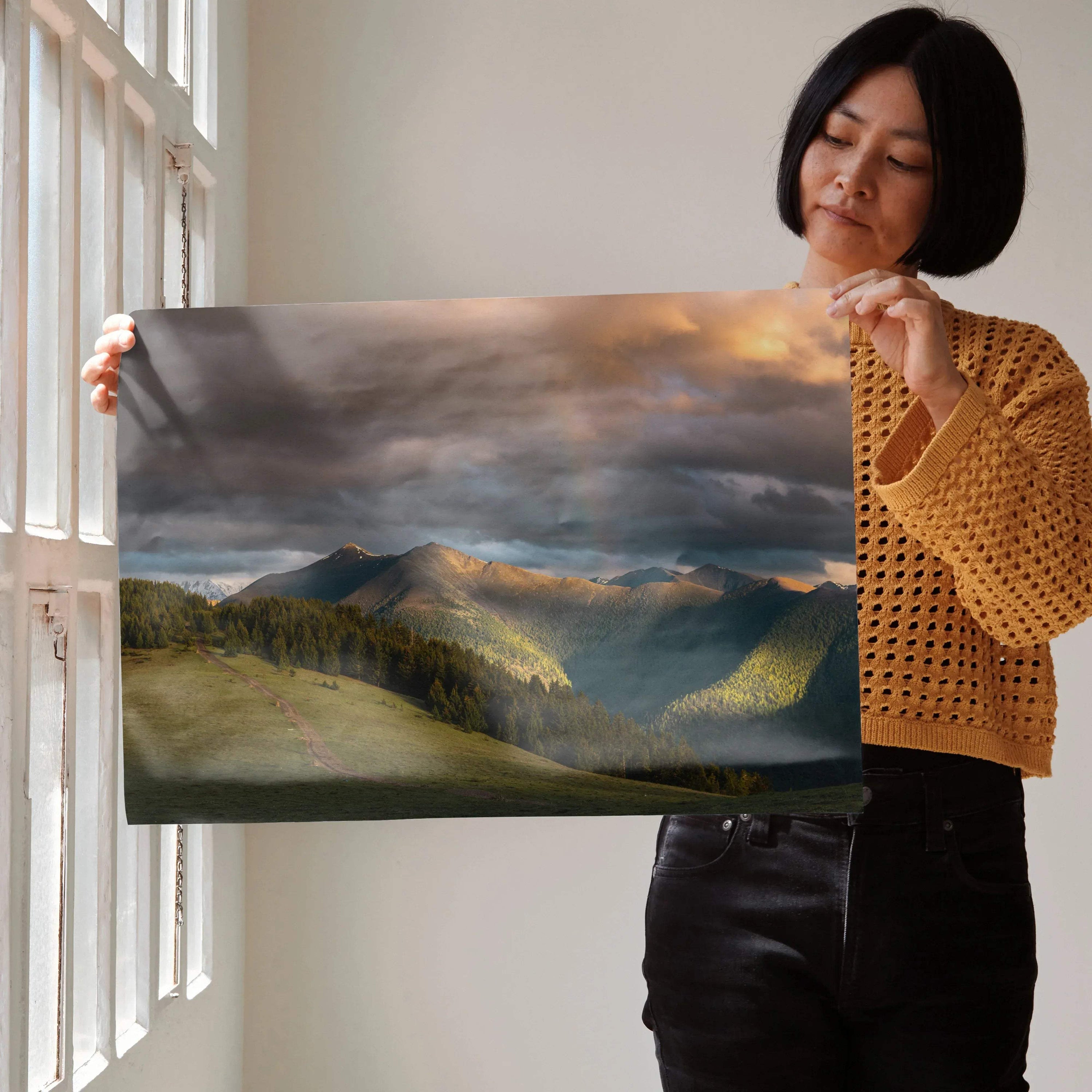 Majestic mountains sunset poster with dramatic clouds and warm light wall art.