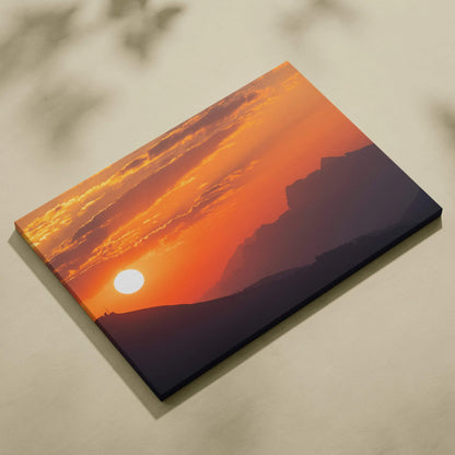 Majestic mountain sunset with vibrant orange sky on canvas wall art panel.