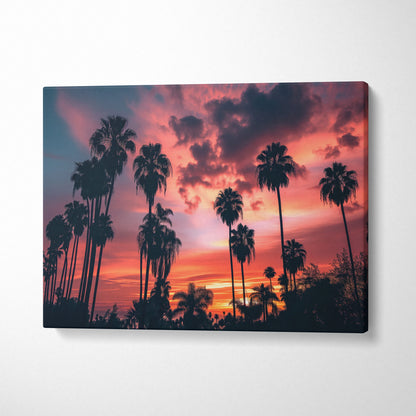 Canvas wall art featuring tropical palm trees silhouetted against a vibrant red and orange sunset sky for stylish decor.