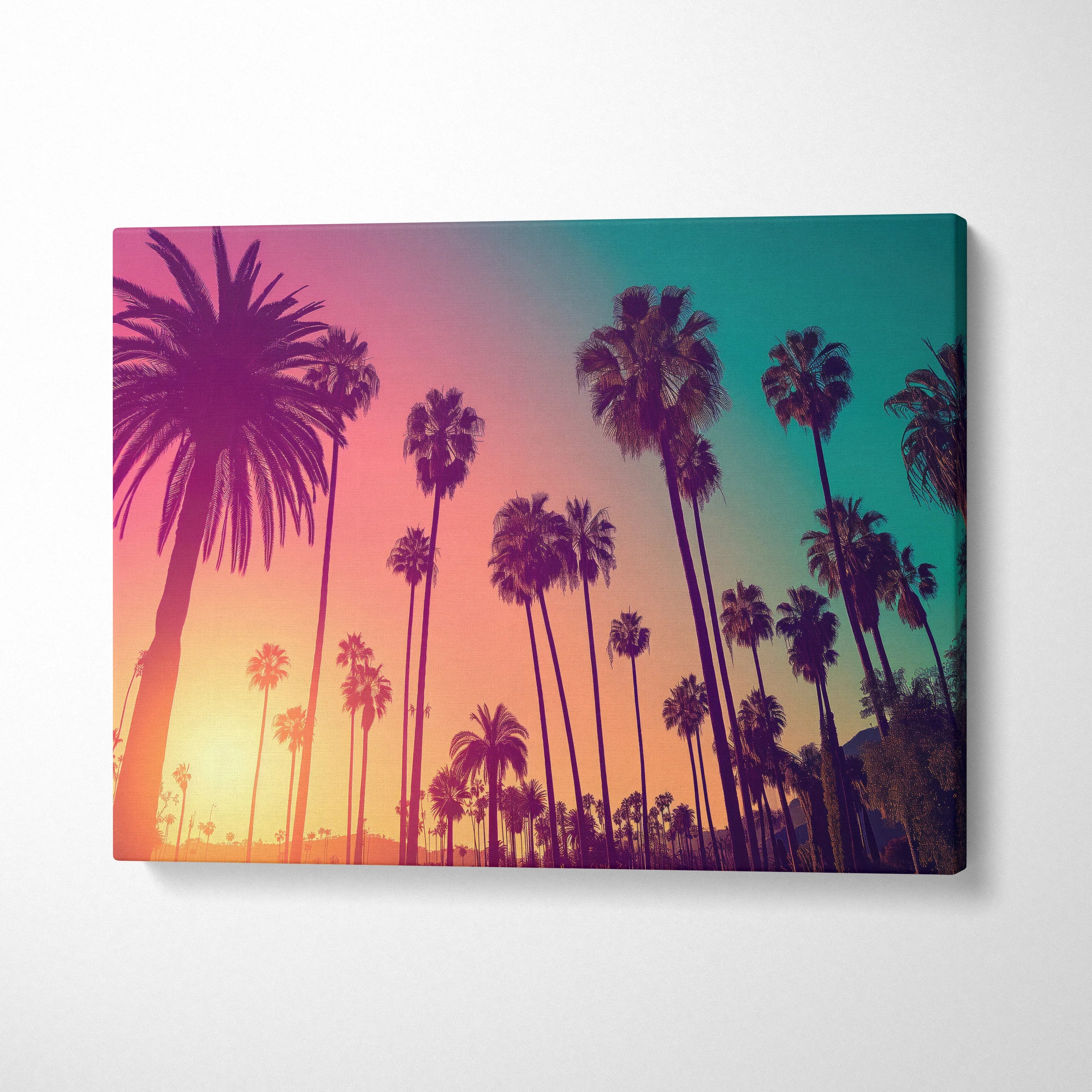 Canvas wall art featuring tropical palm tree silhouettes against a vibrant sunset sky decor.