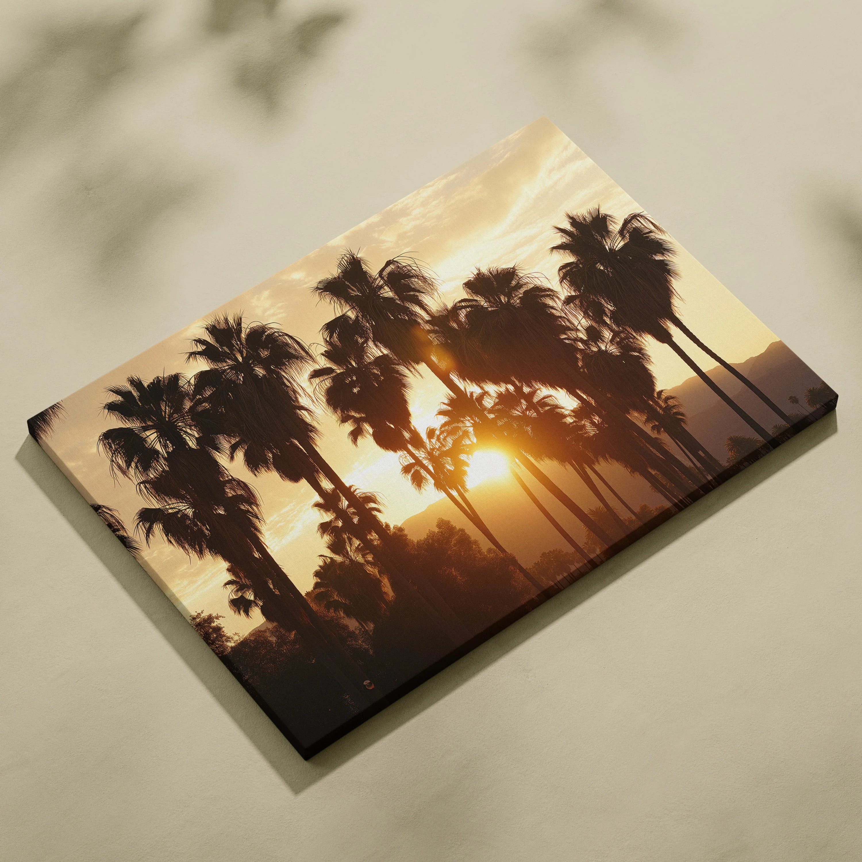 Canvas wall art featuring a tropical sunset with black palm tree silhouettes against a warm orange and yellow sky.