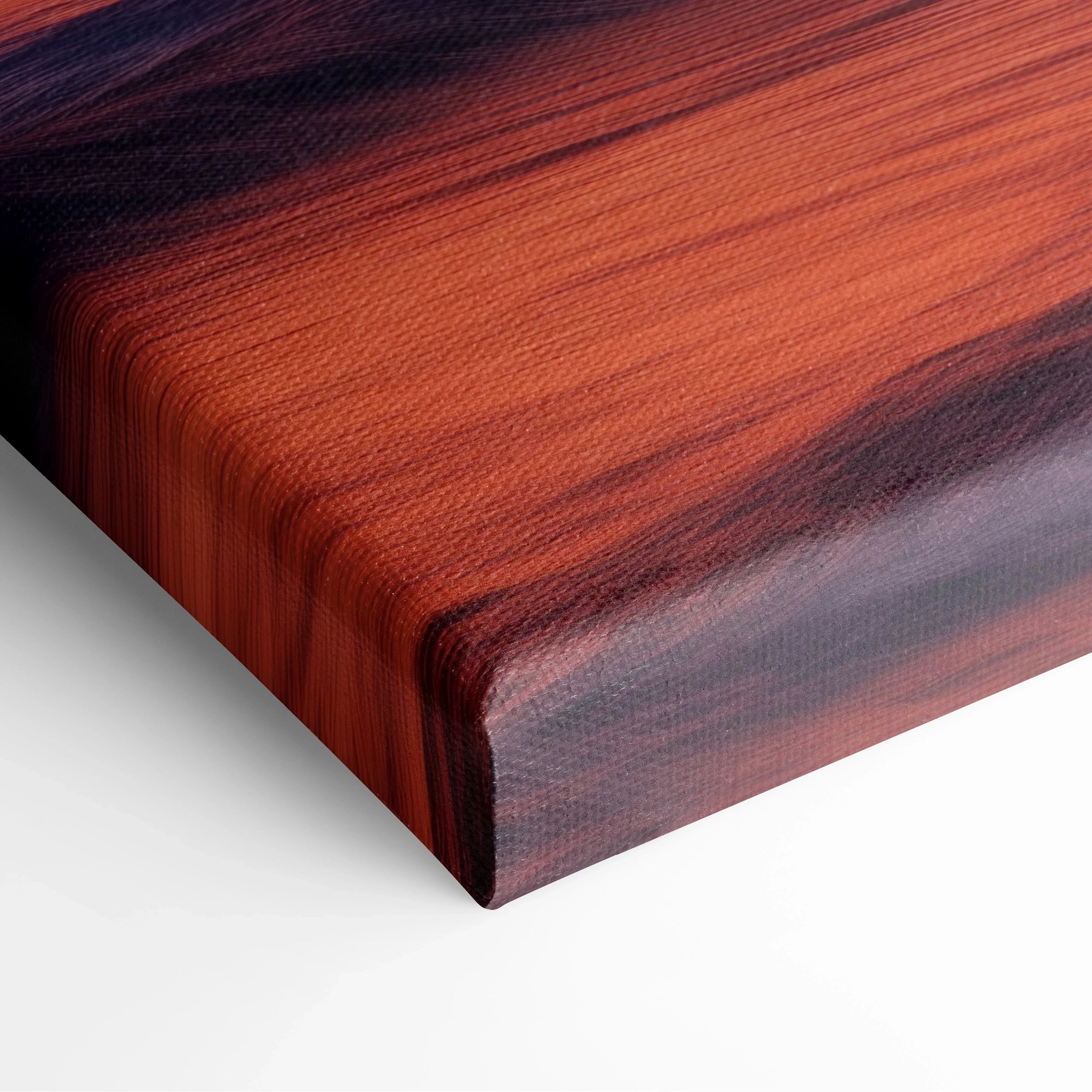 Close-up of canvas art corner with tropical sunset colors in deep orange, red, and black shades, textured beach wall decor.