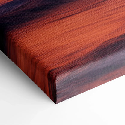 Close-up of canvas art corner with tropical sunset colors in deep orange, red, and black shades, textured beach wall decor.