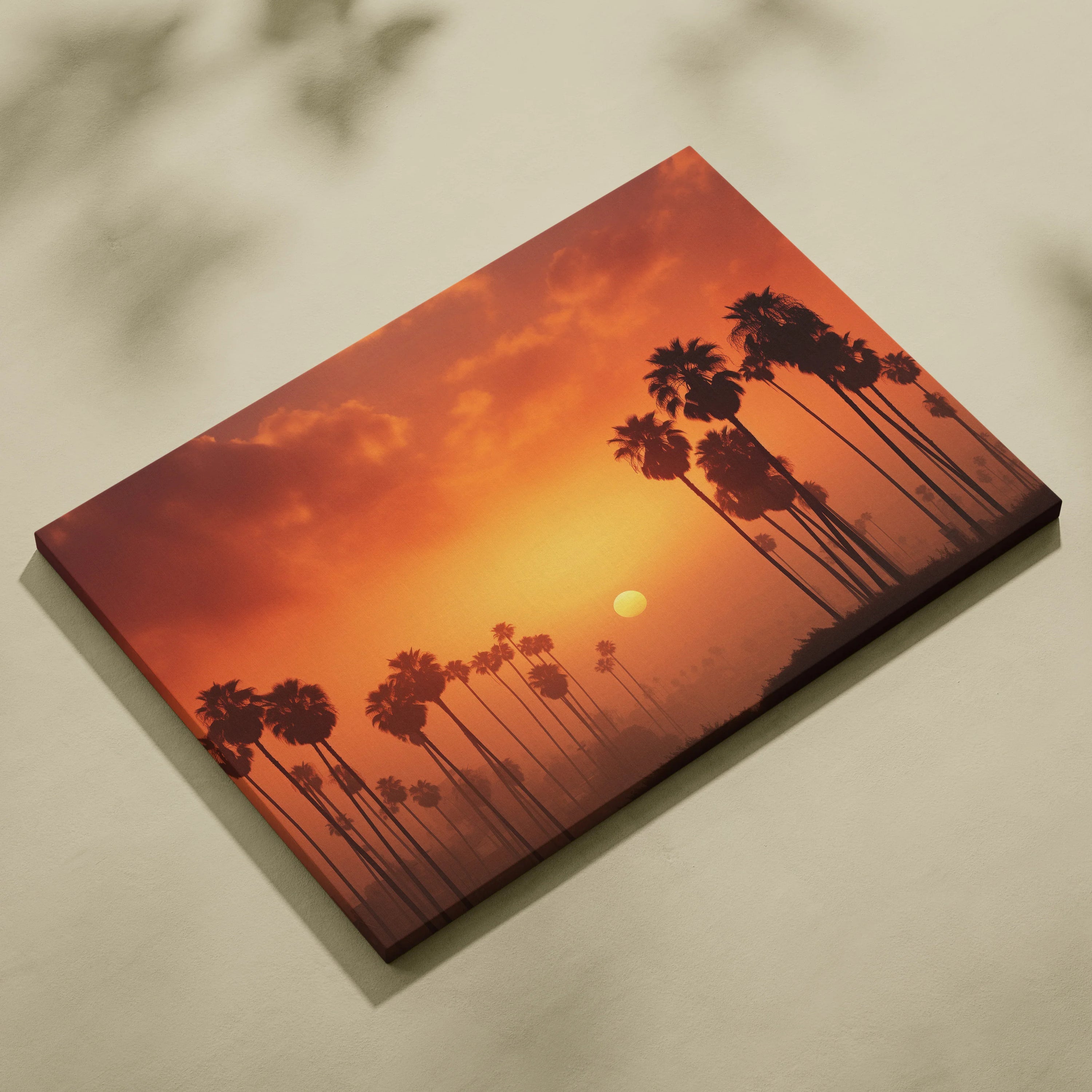 Canvas wall art featuring a tropical sunset with silhouetted palm trees against an orange sky.