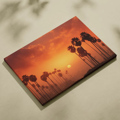 Canvas wall art featuring a tropical sunset with silhouetted palm trees against an orange sky.