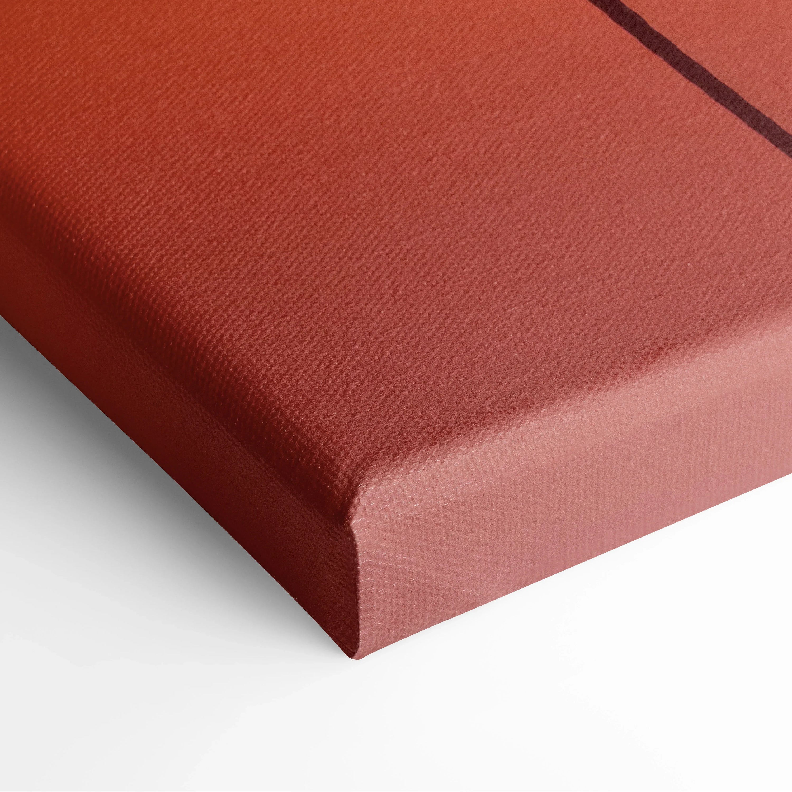 Close-up of textured canvas edge in deep sunset orange with a dark palm tree silhouette detail at the border.