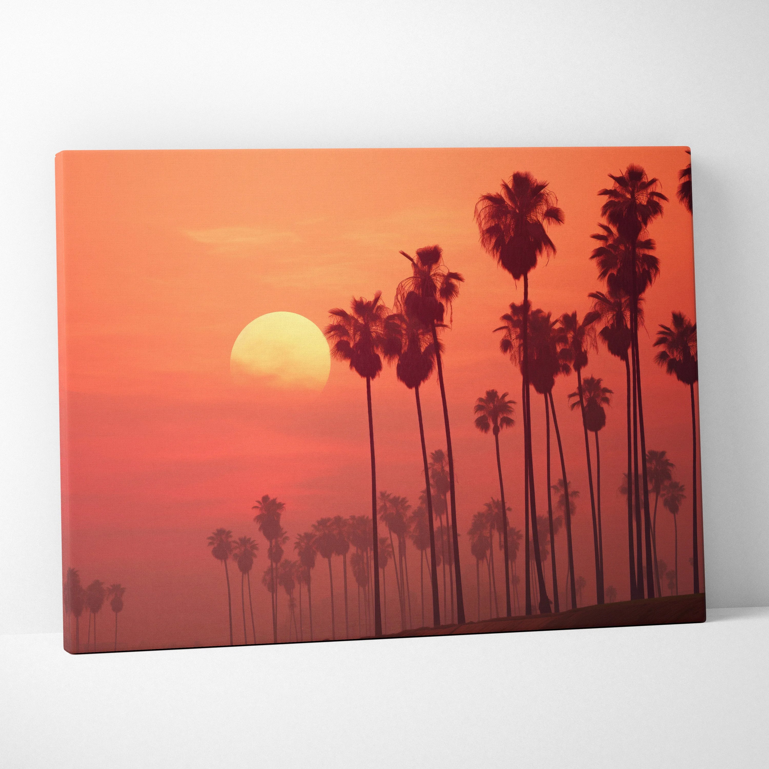 Canvas wall art featuring digital art of tropical palm tree silhouettes against a vibrant orange sunset decor.