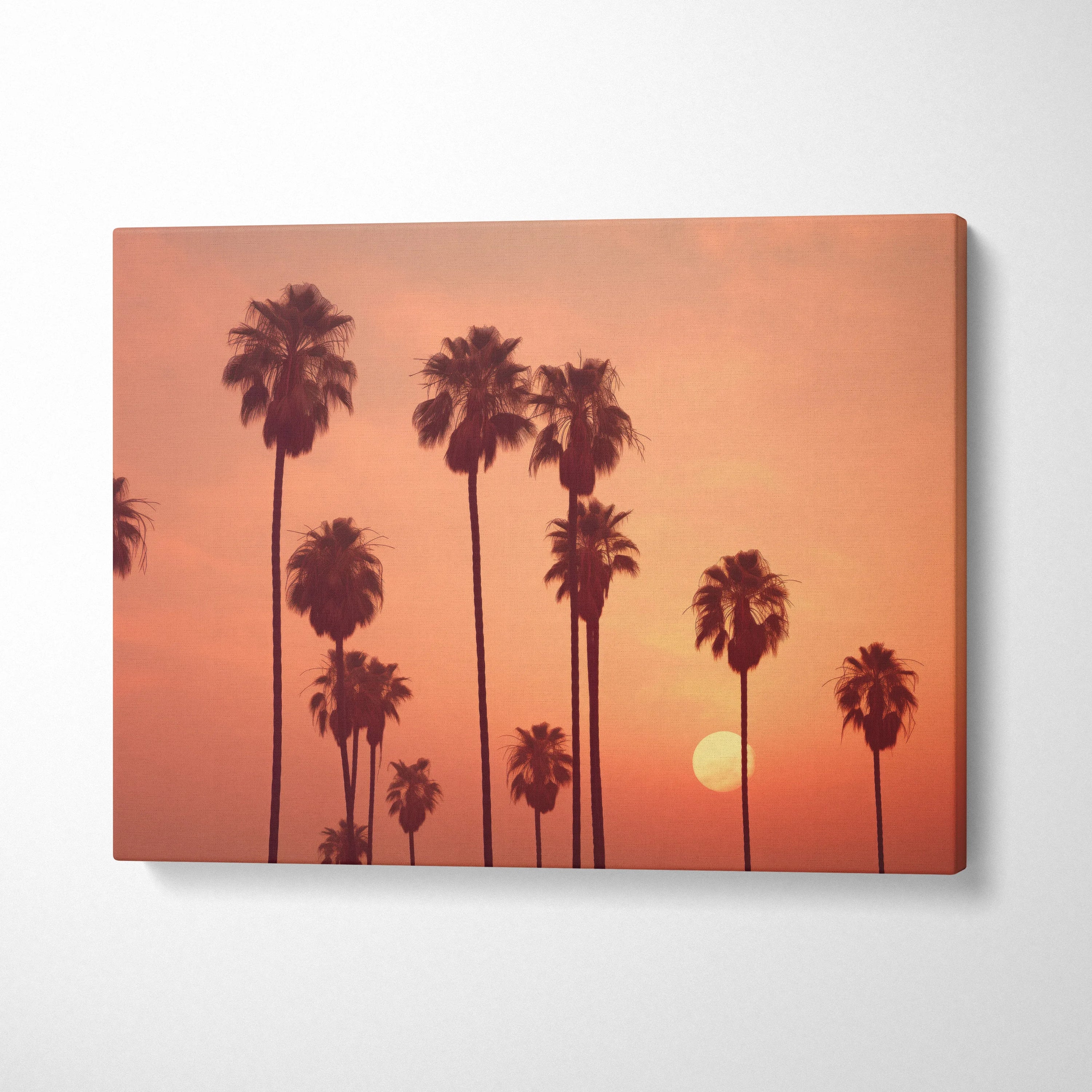 Tropical palm tree silhouettes on sunset gradient canvas wall art decor.