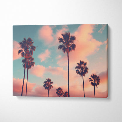 Canvas wall art featuring tall palm tree silhouettes against a pink and blue tropical sunset sky.