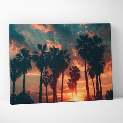 Canvas wall art featuring dark palm tree silhouettes against a vibrant orange and blue tropical sunset sky.