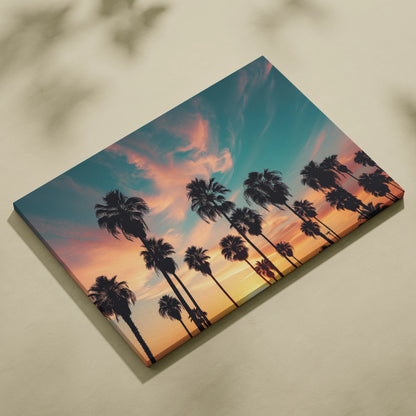 Canvas wall art featuring black palm tree silhouettes against a vibrant sunset sky with orange, pink, and blue hues.