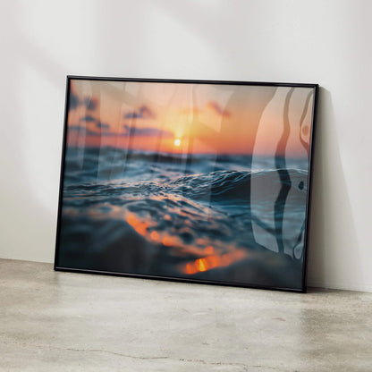 Tranquil ocean waves at sunset wall art poster with vibrant colors in black frame.